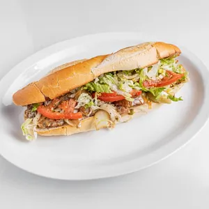 10-inch baguette sandwich with Italian sausage, mozzarella, provolone, caramelized onions, eggplant, lettuce, and tomato