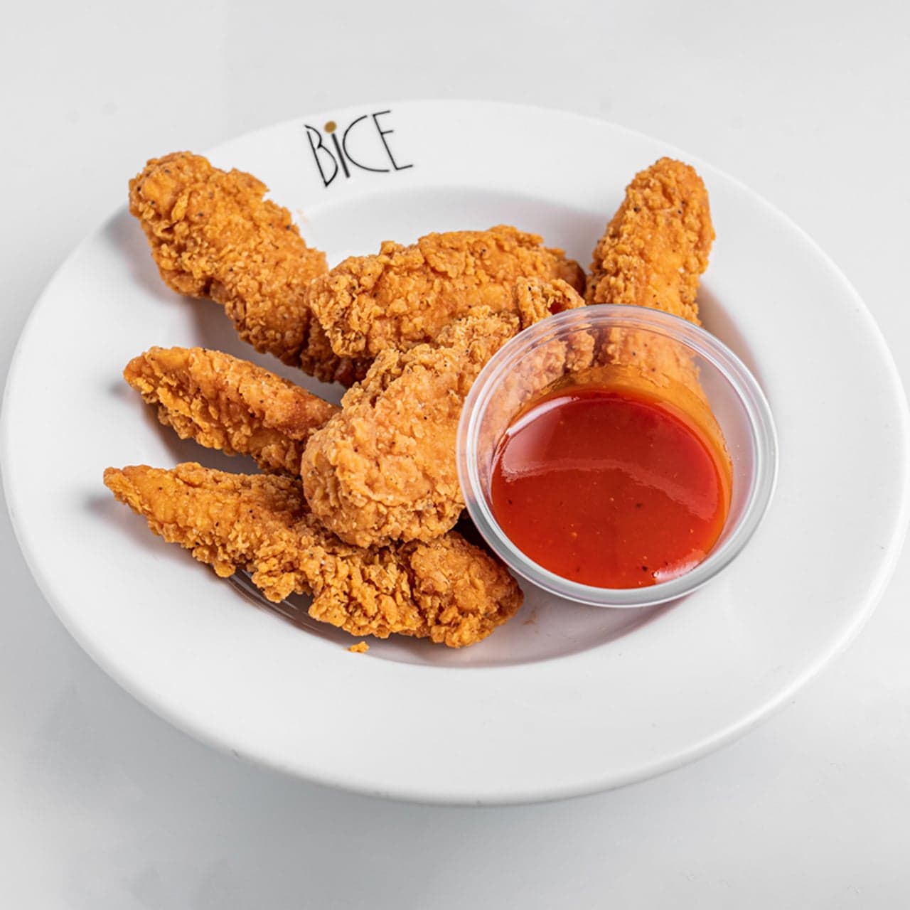 Crispy chicken tenders served with Signature BBQ sauce