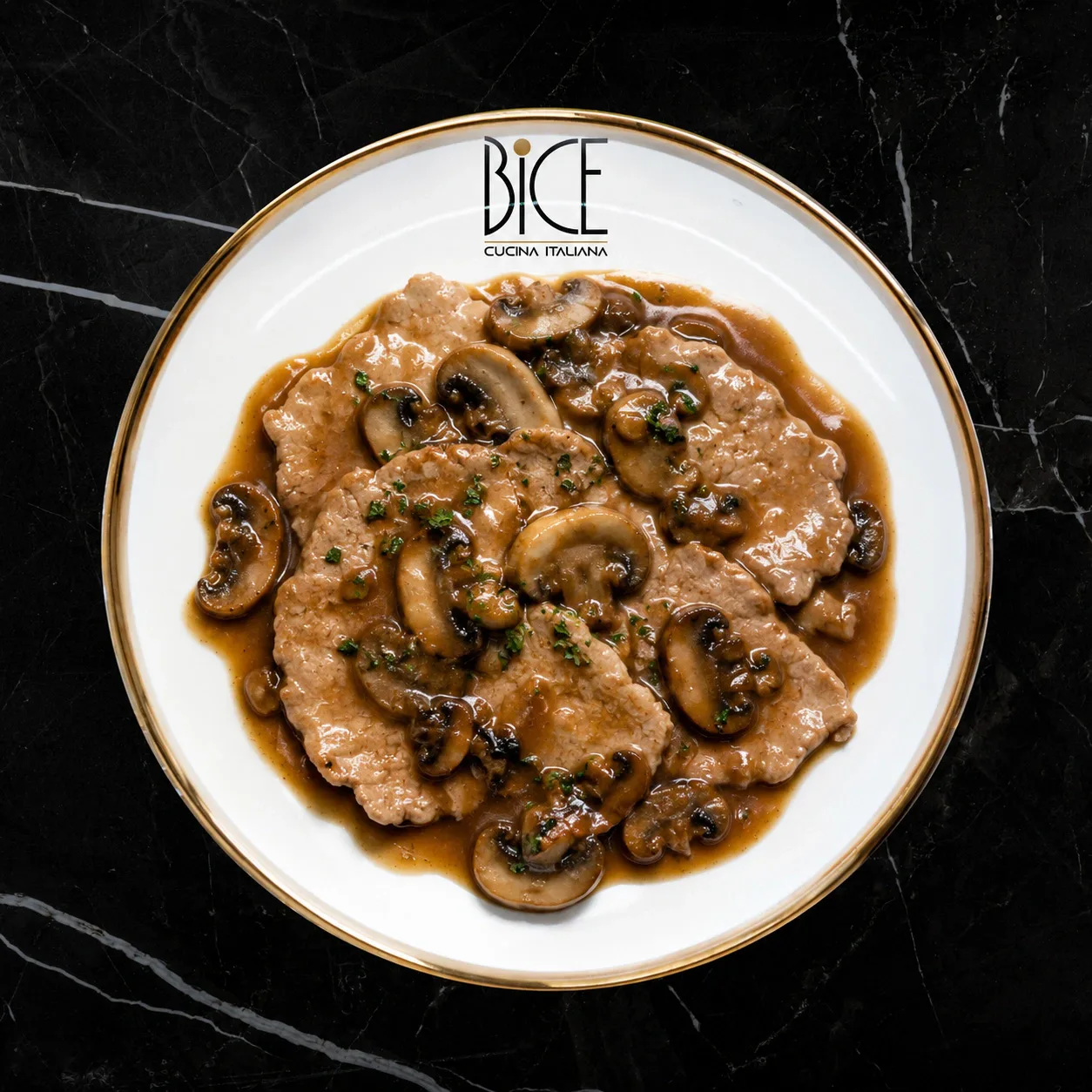 Veal with mushrooms and Marsala sauce Tender Italian cuisine veal with mushrooms in a rich Marsala wine sauce